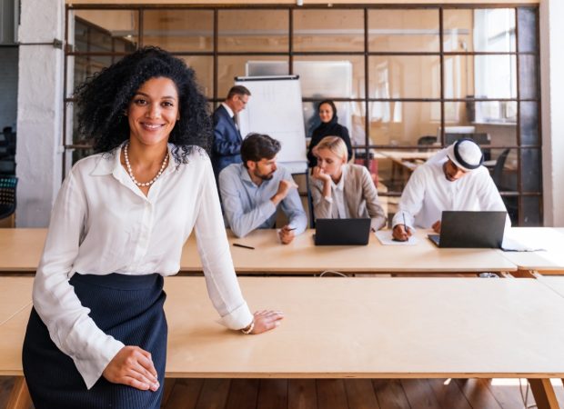 What we do Multiethnic corporate business team meeting in the office for a strategic marketing plan - Office workers, entrepreneurs and company employee at work in a multinational company