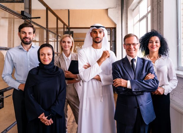 What we do Multiethnic corporate business team meeting in the office for a strategic marketing plan - Office workers, entrepreneurs and company employee at work in a multinational company